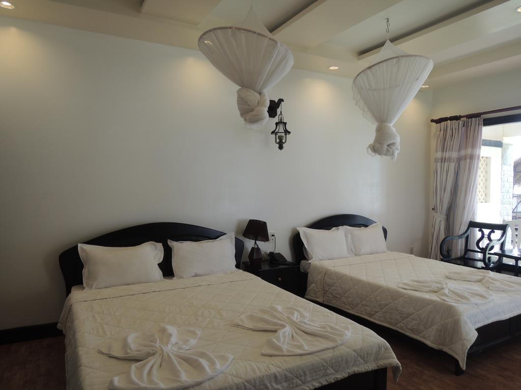 Hotel Ngoc Bich Bungalow Phan Thiết Pokoj fotografie