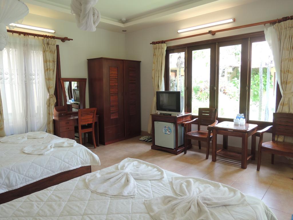 Hotel Ngoc Bich Bungalow Phan Thiết Pokoj fotografie