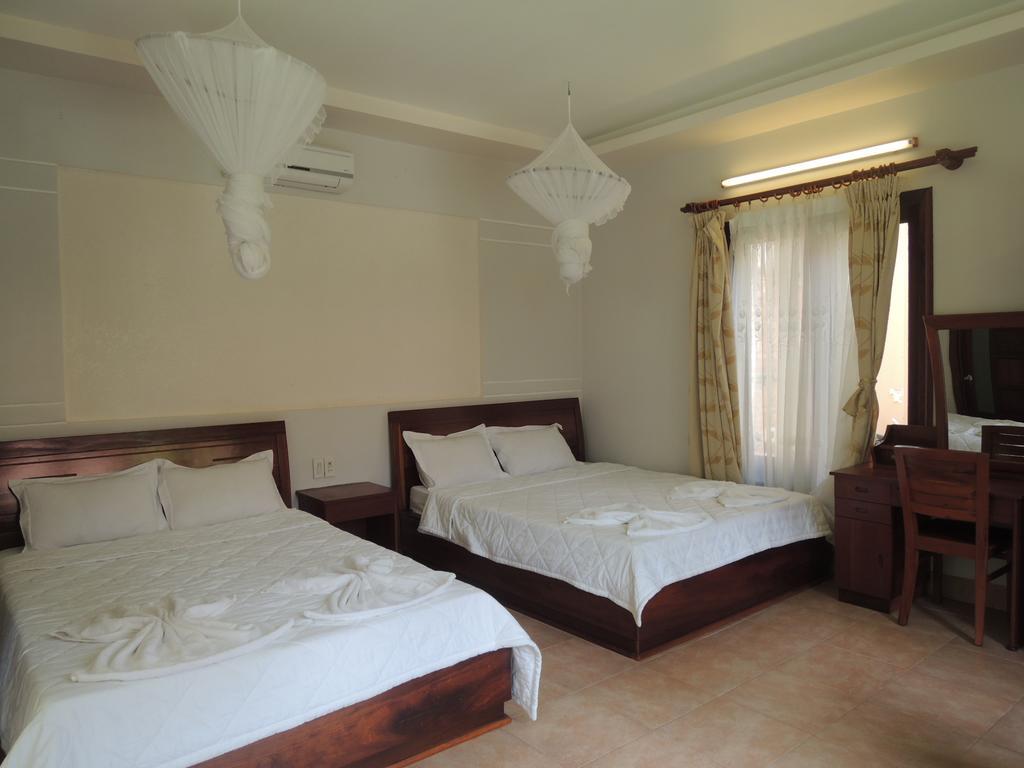 Hotel Ngoc Bich Bungalow Phan Thiết Pokoj fotografie