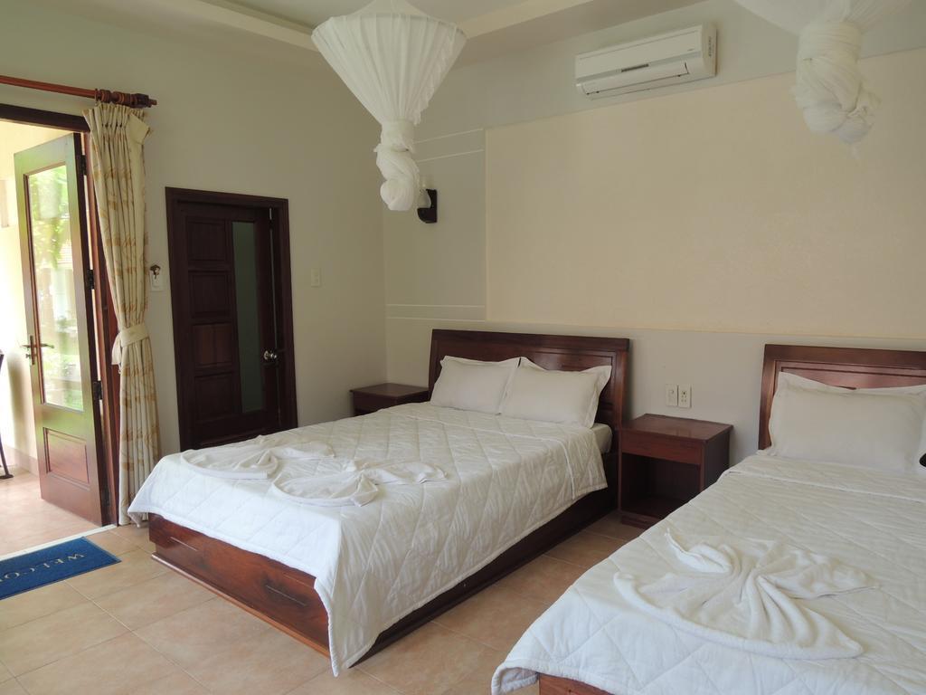 Hotel Ngoc Bich Bungalow Phan Thiết Pokoj fotografie